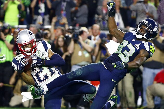 Feb 1, 2015; Glendale, AZ, USA; New England Patriots strong safety Malcolm Butler (21) intercepts a pass intended for Seattle Seahawks wide receiver Ricardo Lockette (83) in the fourth quarter in Super Bowl XLIX at University of Phoenix Stadium. Mandatory Credit: Mark J. Rebilas-USA TODAY Sports