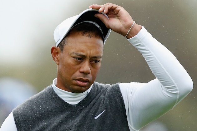 SCOTTSDALE, AZ - JANUARY 30:  Tiger Woods waits on the ninth green after marking his golf ball during the second round of the Waste Management Phoenix Open at TPC Scottsdale on January 30, 2015 in Scottsdale, Arizona.  (Photo by Scott Halleran/Getty Images)