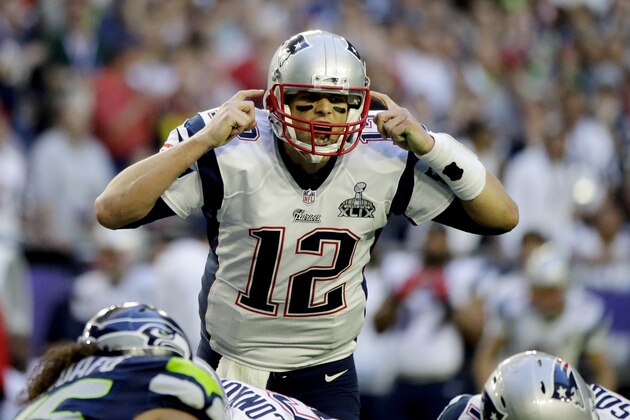 New England Patriots quarterback Tom Brady (12) callas a play against the Seattle Seahawks during the first half of NFL Super Bowl XLIX football game Sunday, Feb. 1, 2015, in Glendale, Ariz. (AP Photo/David Goldman)