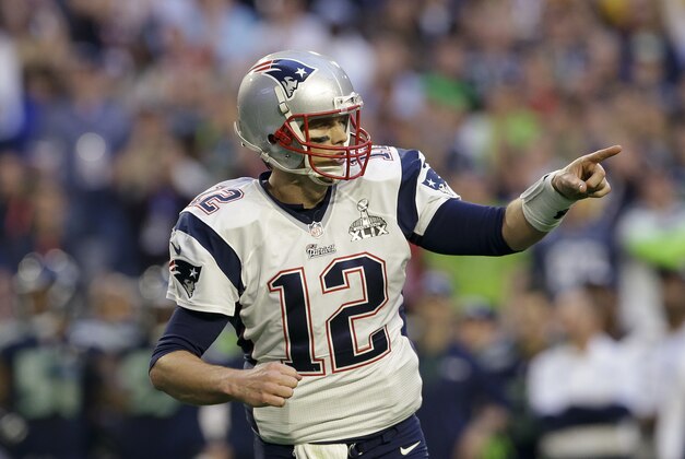 New England Patriots quarterback Tom Brady (12) gestures during the first half of NFL Super Bowl XLIX football game against the Seattle Seahawks Sunday, Feb. 1, 2015, in Glendale, Ariz. (AP Photo/Patrick Semansky)