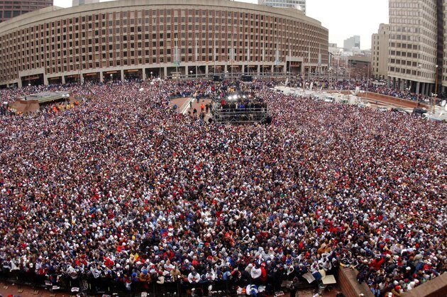 New England Patriot fans fill Boston City Hall Plaza, Tuesday, Feb. 3, 2004 as they celebrate the Super Bowl champions during a victory parade and rally in downtown Boston. (AP Photo/Don Harney