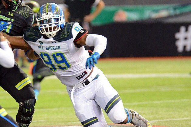 Jan 2, 2015; St. Petersburg, FL, USA; Team Highlight defensive end Byron Cowart (99) rushes the quarterback during the second half of the 2015 Under Armour All-America Game at Tropicana Field. Team Highlight defeated Team Armour  46-6. Mandatory Credit: Jonathan Dyer-USA TODAY Sports