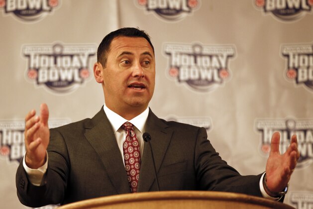 Southern California head coach Steve Sarkisian answers questions during a news conference, Friday, Dec. 26, 2014, in San Diego. USC takes on Nebraska in the Holiday Bowl on Saturday. (AP Photo/Lenny Ignelzi)