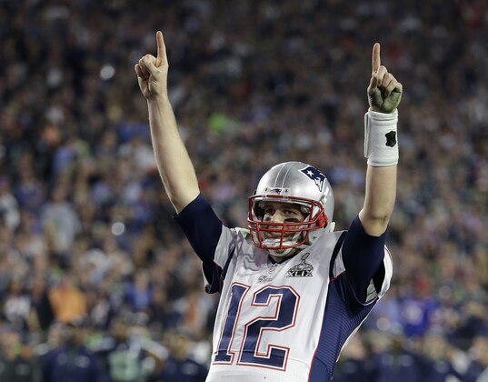 New England Patriots quarterback Tom Brady (12) celebrates during the second half of NFL Super Bowl XLIX football game against the Seattle Seahawks on Sunday, Feb. 1, 2015, in Glendale, Ariz. The Patriots won 28-24. (AP Photo/Kathy Willens)