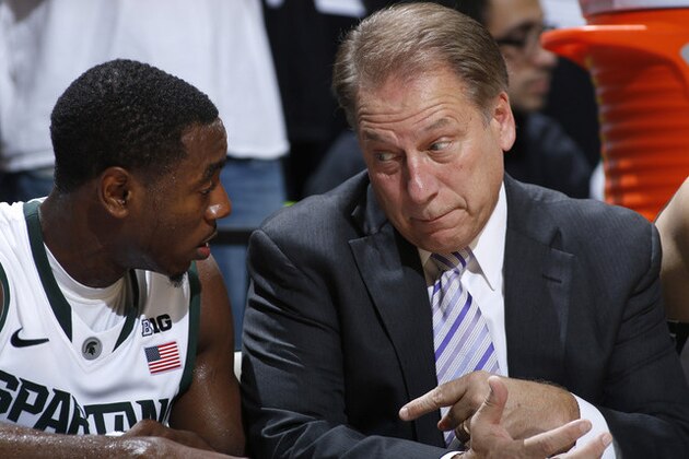 Michigan State coach Tom Izzo, right, talks with Lourawls Nairn Jr. during the second half of an NCAA college basketball exhibition game against St. Cloud State, Friday, Nov. 7, 2014, in East Lansing, Mich. (AP Photo/Al Goldis)
