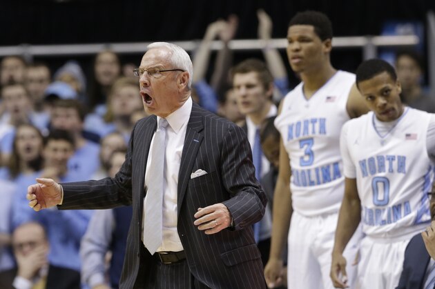 North Carolina coach Roy Williams reacts during the second half of an NCAA college basketball game against Virginia in Chapel Hill, N.C., Monday, Feb. 2, 2015.  Virginia won 75-64. (AP Photo/Gerry Broome)