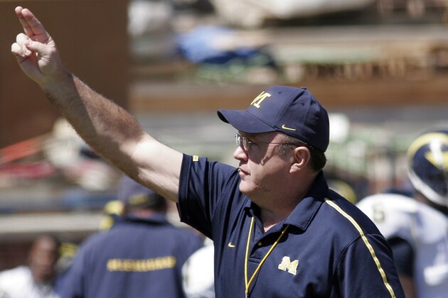 Michigan offensive coordinator Mike DeBord calls a play during Michigan's annual spring football game Saturday, April 15, 2006, in Ann Arbor, Mich. (AP Photo/Tony Ding)