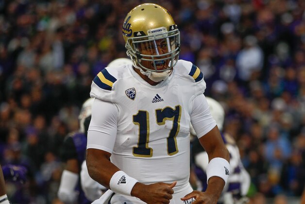SEATTLE, WA - NOVEMBER 08:  Quarterback Brett Hundley #17 of the UCLA Bruins reacts after scoring a touchdown in the first quarter against the Washington Huskies on November 8, 2014 at Husky Stadium in Seattle, Washington.  (Photo by Otto Greule Jr/Getty Images)