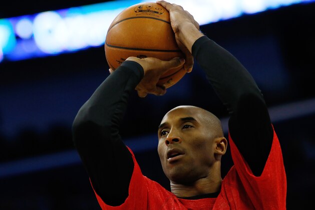 Los Angeles Lakers guard Kobe Bryant warms up before an NBA basketball game, Wednesday, Jan. 21, 2015, in New Orleans. (AP Photo/Jonathan Bachman)