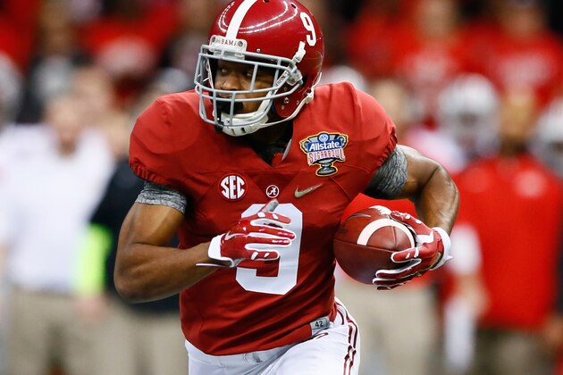 NEW ORLEANS, LA - JANUARY 01:  Amari Cooper #9 of the Alabama Crimson Tide runs the ball in the first quarter against the Ohio State Buckeyes during the All State Sugar Bowl at the Mercedes-Benz Superdome on January 1, 2015 in New Orleans, Louisiana.  (Photo by Kevin C. Cox/Getty Images)