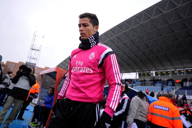 GETAFE, SPAIN - JANUARY 18:  Cristiano Ronaldo of Real Madrid takes to the field of play prior to the La Liga match between Getafe CF and Real Madrid CF at Coliseum Alfonso Perez stadium on January 18, 2015 in Getafe, Spain.  (Photo by Denis Doyle/Getty Images)