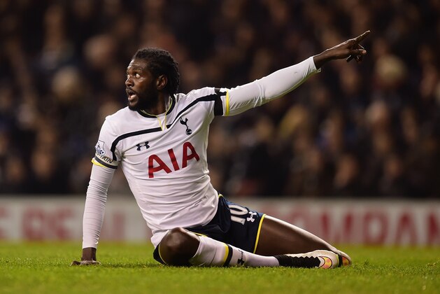 LONDON, ENGLAND - JANUARY 21:  Emmanuel Adebayour of Spurs reacts during the Capital One Cup Semi-Final first leg match between Tottenham Hotspur and Sheffield United at White Hart Lane on January 21, 2015 in London, England.  (Photo by Jamie McDonald/Getty Images)