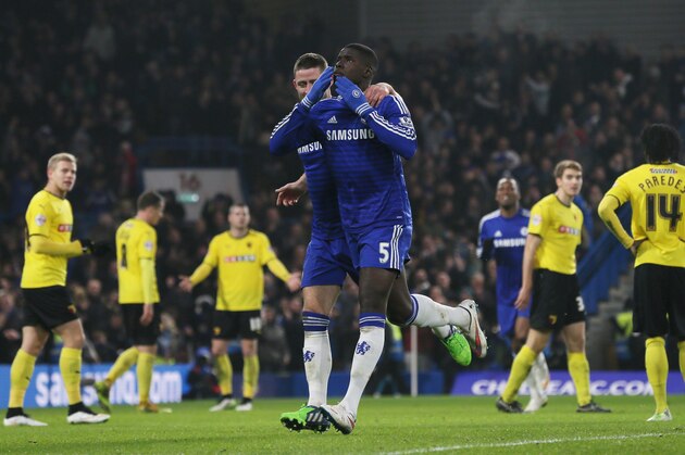 Chelsea’s Kurt Zouma, right, celebrates after scoring a goal with teammate Gary Cahill during the English FA Cup third round soccer match between Chelsea and Watford at Stamford Bridge in London, England, Sunday, Jan. 4, 2015. (AP Photo/Tim Ireland)