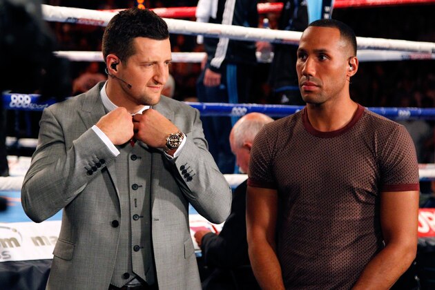 LIVERPOOL, ENGLAND - JULY 12:  Boxers Carl Froch (L) and James DeGale are seen ring side as they wait for a television interview during the Collision Course fight night at the Liverpool Echo Arena on July 12, 2014 in Liverpool, England. (Photo by Paul Thomas/Getty Images)
