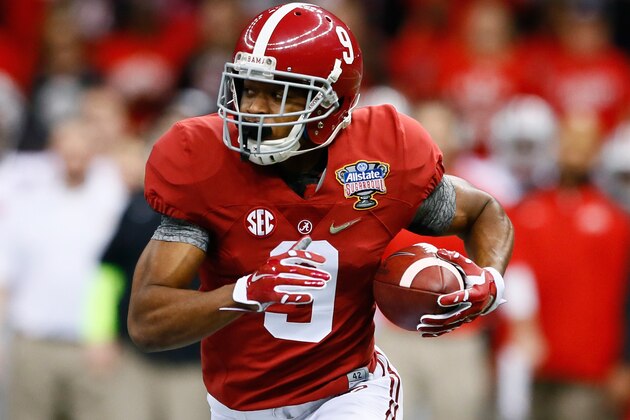 NEW ORLEANS, LA - JANUARY 01:  Amari Cooper #9 of the Alabama Crimson Tide runs the ball in the first quarter against the Ohio State Buckeyes during the All State Sugar Bowl at the Mercedes-Benz Superdome on January 1, 2015 in New Orleans, Louisiana.  (Photo by Kevin C. Cox/Getty Images)