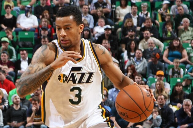 SALT LAKE CITY, UT - JANUARY 26: Trey Burke #3 of the Utah Jazz handles the ball against the Boston Celtics on January 26, 2015 at EnergySolutions Arena in Salt Lake City, Utah. NOTE TO USER: User expressly acknowledges and agrees that, by downloading and or using this Photograph, User is consenting to the terms and conditions of the Getty Images License Agreement. Mandatory Copyright Notice: Copyright 2015 NBAE (Photo by Melissa Majchrzak/NBAE via Getty Images)