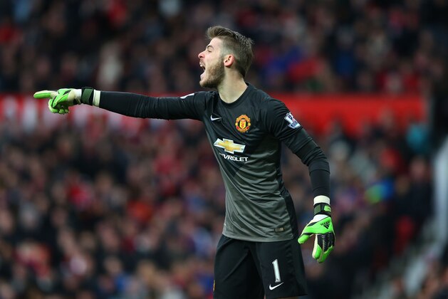 MANCHESTER, ENGLAND - JANUARY 31:  Goalkeeper David De Gea of Manchester United directs his defence during the Barclays Premier League match between Manchester United and Leicester City at Old Trafford on January 31, 2015 in Manchester, England.  (Photo by Alex Livesey/Getty Images)