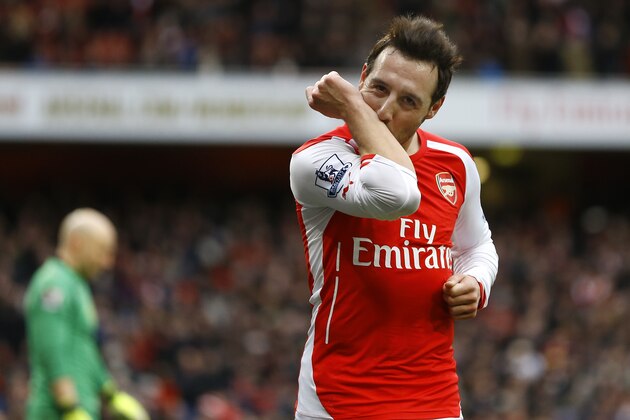Arsenal's  Santi Cazorla celebrates scoring a goal during the English Premier League soccer match between Arsenal and Aston Villa at the Emirates stadium in London, Sunday, Feb. 1, 2015. (AP Photo/Kirsty Wigglesworth)