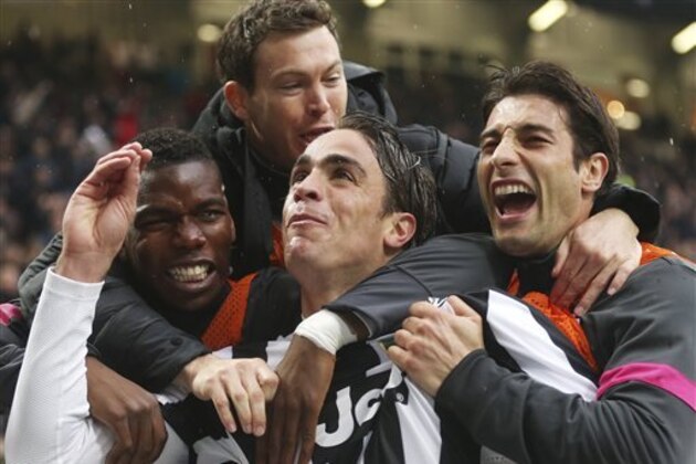 Juventus forward Alessandro Matri, center, celebrates with his teammates after scoring during the Serie A soccer match between Inter Milan and Juventus at the San Siro stadium in Milan, Italy, Saturday, March 30, 2013. (AP Photo/Antonio Calanni)