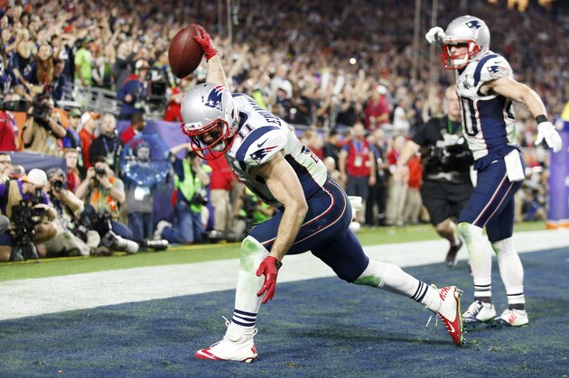 GLENDALE, AZ - FEBRUARY 01:  Julian Edelman #11 of the New England Patriots celebrates by spiking the ball after scoring a touchdown against the Seattle Seahawks in the fourth quarter during Super Bowl XLIX at University of Phoenix Stadium on February 1, 2015 in Glendale, Arizona.  (Photo by Christian Petersen/Getty Images)