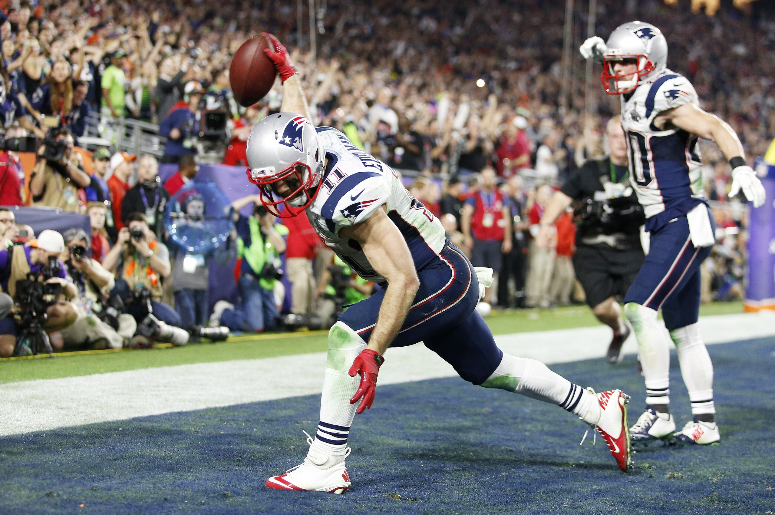 GLENDALE, AZ - FEBRUARY 01:  Julian Edelman #11 of the New England Patriots celebrates by spiking the ball after scoring a touchdown against the Seattle Seahawks in the fourth quarter during Super Bowl XLIX at University of Phoenix Stadium on February 1, 2015 in Glendale, Arizona.  (Photo by Christian Petersen/Getty Images)