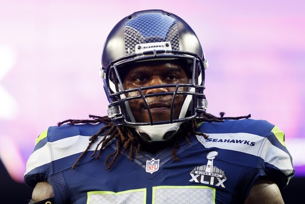 GLENDALE, AZ - FEBRUARY 01:   James Carpenter #77 of the Seattle Seahawks stands on the field prior to Super Bowl XLIX at University of Phoenix Stadium on February 1, 2015 in Glendale, Arizona.  (Photo by Christian Petersen/Getty Images)