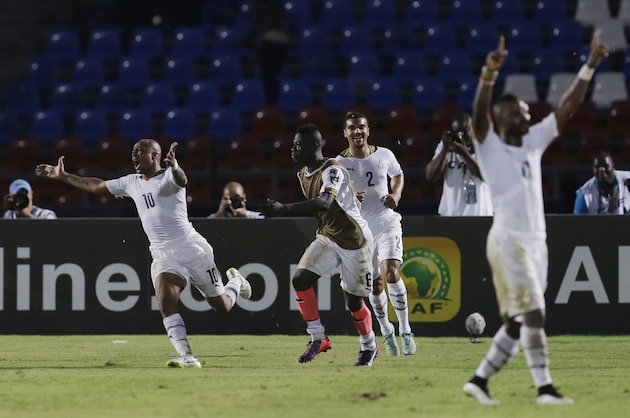 Ghana's Andre Ayew, left, celebrates with teammates after scoring a goal during their African Cup of Nations Group C soccer match in Mongomo, Equatorial Guinea, Tuesday, Jan. 27, 2015. (AP Photo/Themba Hadebe)