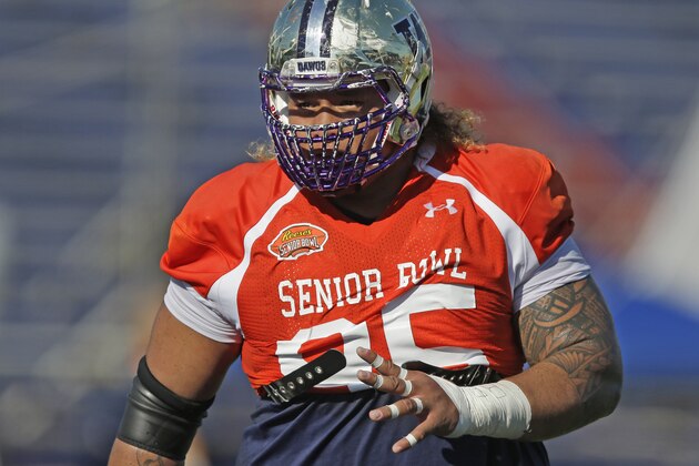 Washington defensive tackle Danny Shelton (95) looks on during NCAA college football practice for the Senior Bowl, Wednesday, Jan. 21, 2015, at Ladd-Peebles Stadium in Mobile, Ala. (AP Photo/Brynn Anderson)