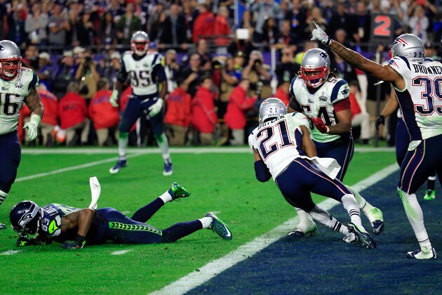 GLENDALE, AZ - FEBRUARY 01:  Malcolm Butler #21 of the New England Patriots intercepts a pass by  Russell Wilson #3 of the Seattle Seahawks late in the fourth quarter during Super Bowl XLIX at University of Phoenix Stadium on February 1, 2015 in Glendale, Arizona.  (Photo by Rob Carr/Getty Images)