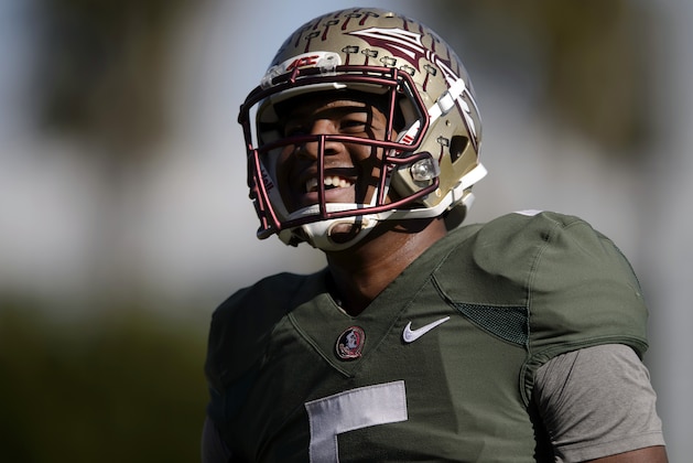 Florida State quarterback Jameis Winston laughs during NCAA college football practice in Carson, Calif., Sunday, Dec. 28, 2014. Florida State is scheduled to play Oregon in the Rose Bowl NCAA college football playoff semifinal on New Year's Day. (AP Photo/Kelvin Kuo)