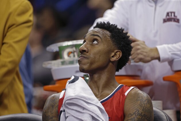 Atlanta Hawks guard Jeff Teague reacts on the bench late in the second half of an NBA basketball game against the New Orleans Pelicans in New Orleans, Monday, Feb. 2, 2015. The Pelicans won 115-100. (AP Photo/Gerald Herbert)