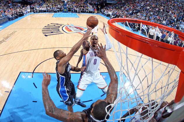 OKLAHOMA CITY, OK- FEBRUARY 2:  Russell Westbrook #0 of the Oklahoma City Thunder shoots the ball against the Orlando Magic during the game on February 2, 2015 at Chesapeake Energy Arena in Oklahoma City, Oklahoma. NOTE TO USER: User expressly acknowledges and agrees that, by downloading and or using this photograph, User is consenting to the terms and conditions of the Getty Images License Agreement. Mandatory Copyright Notice: Copyright 2015 NBAE (Photo by Layne Murdoch/NBAE via Getty Images)