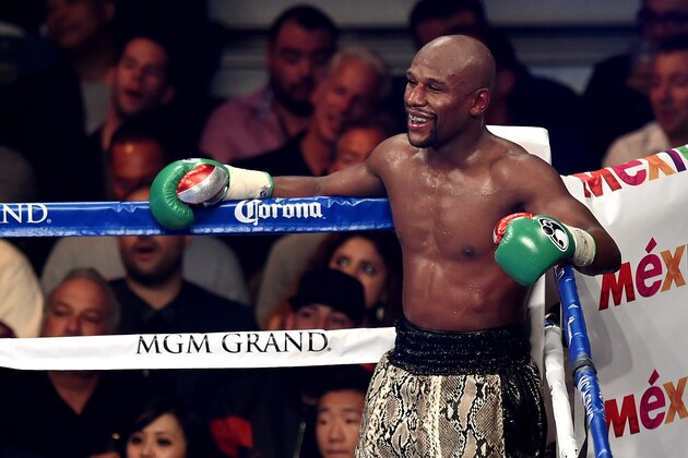 LAS VEGAS, NV - SEPTEMBER 13:  Floyd Mayweather Jr. looks on while taking on Marcos Maidana during their WBC/WBA welterweight title fight at the MGM Grand Garden Arena on September 13, 2014 in Las Vegas, Nevada.  (Photo by Ethan Miller/Getty Images)