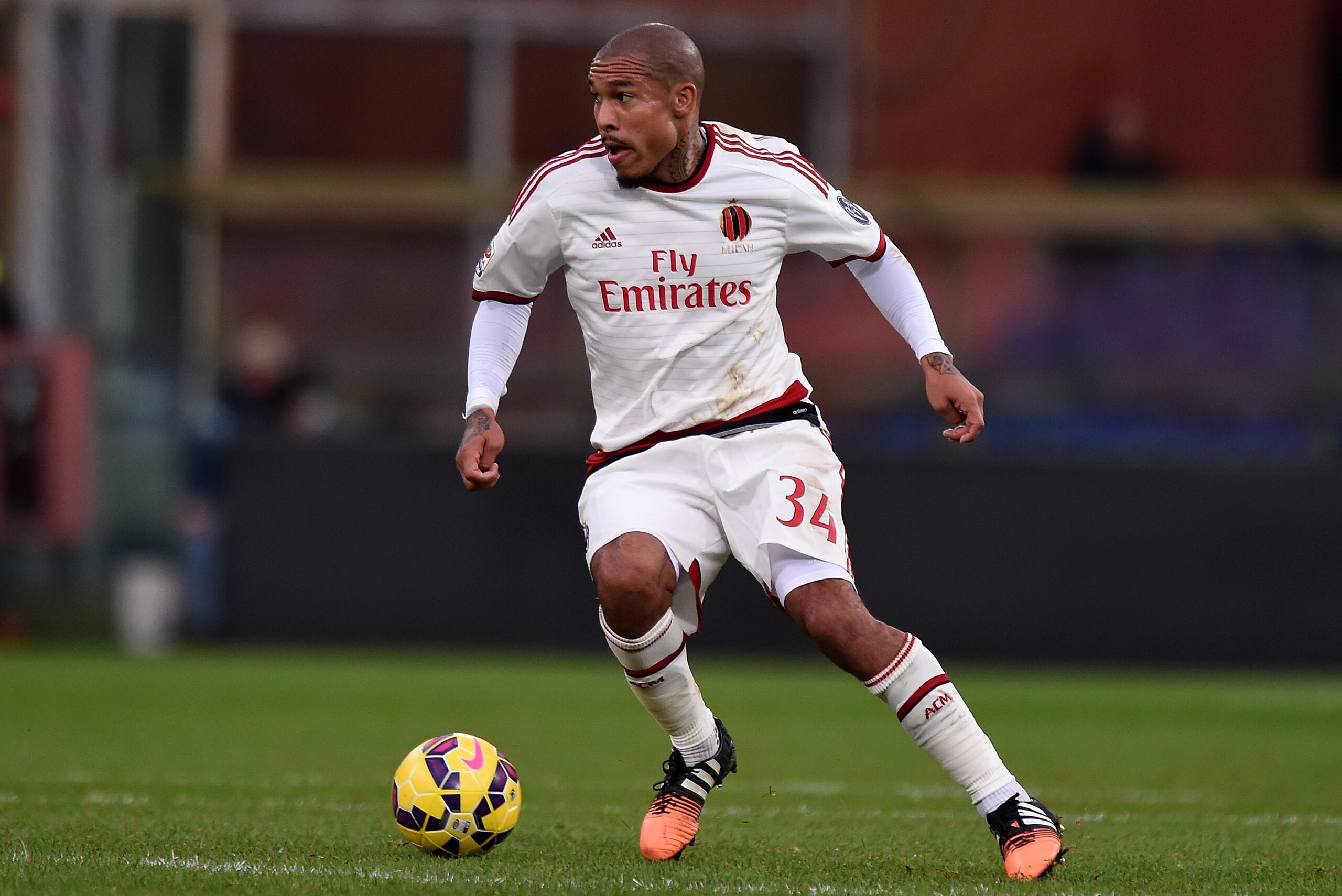 GENOA, ITALY - DECEMBER 07:  Nigel De Jong of Milan in action during the Serie A match between Genoa CFC and AC Milan at Stadio Luigi Ferraris on December 7, 2014 in Genoa, Italy.  (Photo by Tullio M. Puglia/Getty Images)
