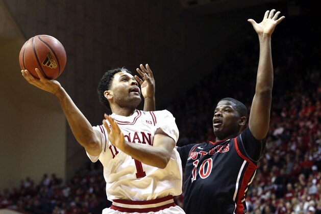 Jan 31, 2015; Bloomington, IN, USA; Indiana Hoosiers guard James Blackmon Jr. (1) drives to the basket against Rutgers Scarlet Knights forward Junior Etou (10) during the first half at Assembly Hall. Mandatory Credit: Aaron Doster-USA TODAY Sports