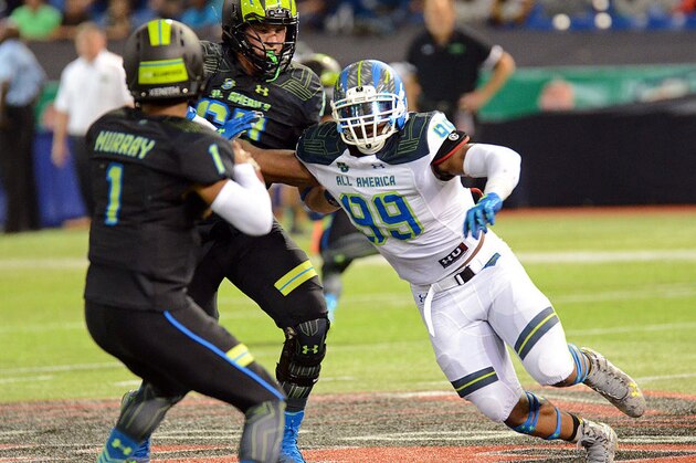 Jan 2, 2015; St. Petersburg, FL, USA; Team Highlight defensive end Byron Cowart (99) rushes the quarterback during the second half of the 2015 Under Armour All-America Game at Tropicana Field. Team Highlight defeated Team Armour  46-6. Mandatory Credit: Jonathan Dyer-USA TODAY Sports