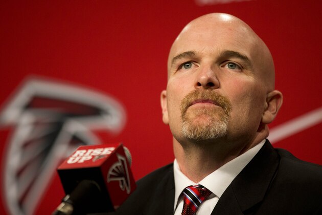 Former Seattle Seahawks defensive coordinator Dan Quinn listens to a question during a news conference to introducing him as the new head coach of the Atlanta Falcons NFL football team, Tuesday, Feb. 3, 2015, in Flowery Branch, Ga. (AP Photo/John Bazemore)
