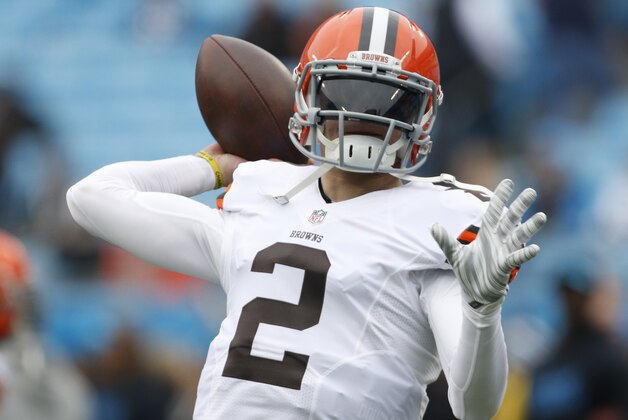 Cleveland Browns' Johnny Manziel (2) warms up before an NFL football game against the Carolina Panthers in Charlotte, N.C., Sunday, Dec. 21, 2014. (AP Photo/Bob Leverone)