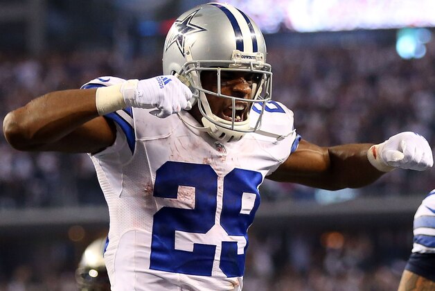 ARLINGTON, TX - JANUARY 04:  DeMarco Murray #29 of the Dallas Cowboys celebrates after running for a touchdown against the Detroit Lions during the second half of their NFC Wild Card Playoff game at AT&T Stadium on January 4, 2015 in Arlington, Texas.  (Photo by Ronald Martinez/Getty Images)