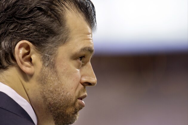 Indianapolis Colts general manager Ryan Grigson watches teams warm up before the start of an NFL wildcard playoff football game between the Indianapolis Colts and the Cincinnati Bengals Sunday, Jan. 4, 2015, in Indianapolis. (AP Photo/AJ Mast)