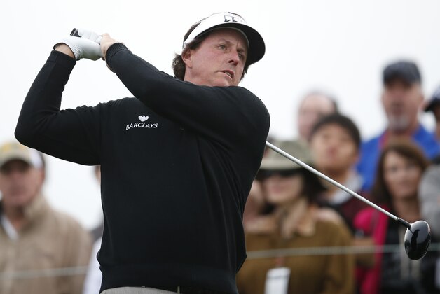 Phil Mickelson tees off on the 11th hole during the first round of the Phoenix Open golf tournament, Thursday, Jan. 29, 2015, in Scottsdale, Ariz. (AP Photo/Rick Scuteri)