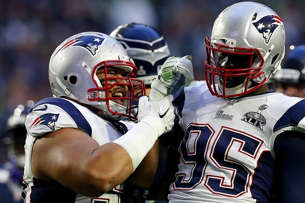 GLENDALE, AZ - FEBRUARY 01:  Sealver Siliga #96 and Chandler Jones #95 of the New England Patriots celebrate a stop against the Seattle Seahawks in the second quarter during Super Bowl XLIX at University of Phoenix Stadium on February 1, 2015 in Glendale, Arizona.  (Photo by Tom Pennington/Getty Images)