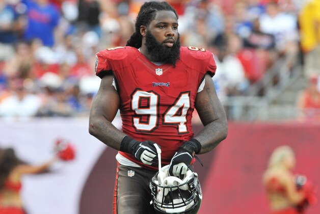 TAMPA, FL -  DECEMBER 8:  Defensive end Adrian Clayborn #94 of the Tampa Bay Buccaneers sets for play against the Buffalo Bills   December 8, 2013 at Raymond James Stadium in Tampa, Florida.  The Bucs won 27 - 6. (Photo by Al Messerschmidt/Getty Images)
