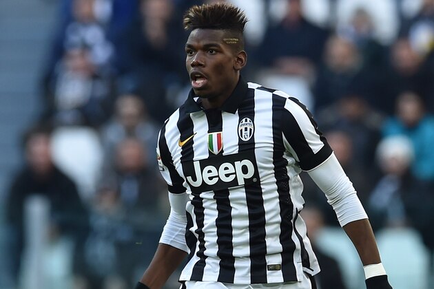 TURIN, ITALY - JANUARY 25:  Paul Pogba of Juventus FC in action during the Serie A match between Juventus FC and AC Chievo Verona at Juventus Arena on January 25, 2015 in Turin, Italy.  (Photo by Valerio Pennicino/Getty Images)