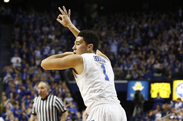 Feb 3, 2015; Lexington, KY, USA; Kentucky Wildcats guard Devin Booker (1) reacts after hitting a three point shot against the Georgia Bulldogs in the first half at Rupp Arena. Mandatory Credit: Mark Zerof-USA TODAY Sports