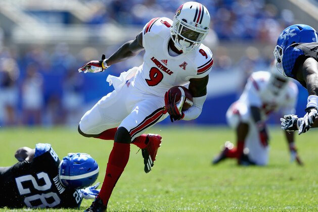 LEXINGTON, KY - SEPTEMBER 14:  DeVante Parker #9 of the Louisville Cardinals runs with the ball during the game against the Kentucky Wildcats at Commonwealth Stadium on September 14, 2013 in Lexington, Kentucky.  (Photo by Andy Lyons/Getty Images)