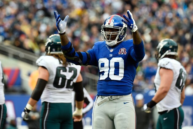 EAST RUTHERFORD, NJ - DECEMBER 28:  Jason Pierre-Paul #90 of the New York Giants reacts against the Philadelphia Eagles during a game at MetLife Stadium on December 28, 2014 in East Rutherford, New Jersey.  (Photo by Alex Goodlett/Getty Images)