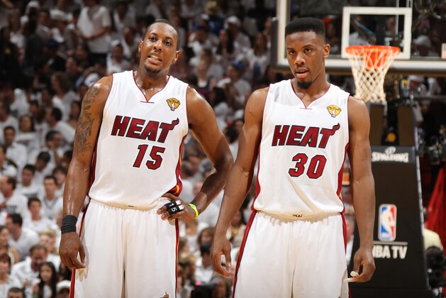 MIAMI, FL - JUNE 21:  Teammates Mario Chalmers #15 and Norris Cole #30 of the Miami Heat during Game Five of the 2012 NBA Finals at American Airlines Arena on June 21, 2012 in Miami, Florida. NOTE TO USER: User expressly acknowledges and agrees that, by downloading and or using this Photograph, user is consenting to the terms and conditions of the Getty Images License Agreement. Mandatory Copyright Notice: Copyright 2012 NBAE (Photo by Nathaniel S. Butler/NBAE via Getty Images)