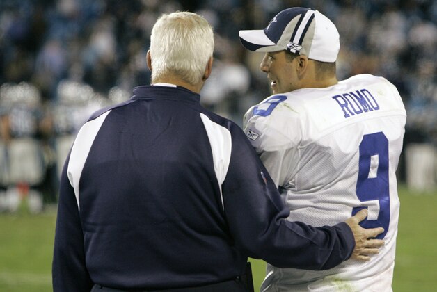 Dallas Cowboys' Tony Romo (9) talks with coach Bill Parcells during the final minutes of the Cowboys' 35-14 win over the Carolina Panthers in an NFL football game in Charlotte, N.C., Sunday, Oct. 29, 2006. (AP Photo/Chuck Burton)