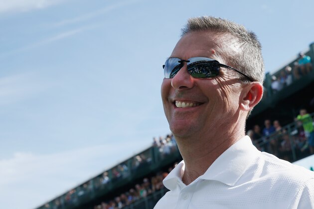 SCOTTSDALE, AZ - JANUARY 28:  Urban Meyer, head football coach at  Ohio State University,  looks up to the gallery on the 16th hole during the pro-am prior to the start of the Waste Management Phoenix Open at TPC Scottsdale on January 28, 2015 in Scottsdale, Arizona.  (Photo by Scott Halleran/Getty Images)